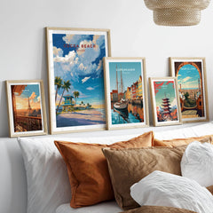 Cocoa Beach Lifeguard Tower Poster - Palm Tree Beach Wall Art in a gallery wall set of five framed travel prints in natural wood frames above a bed