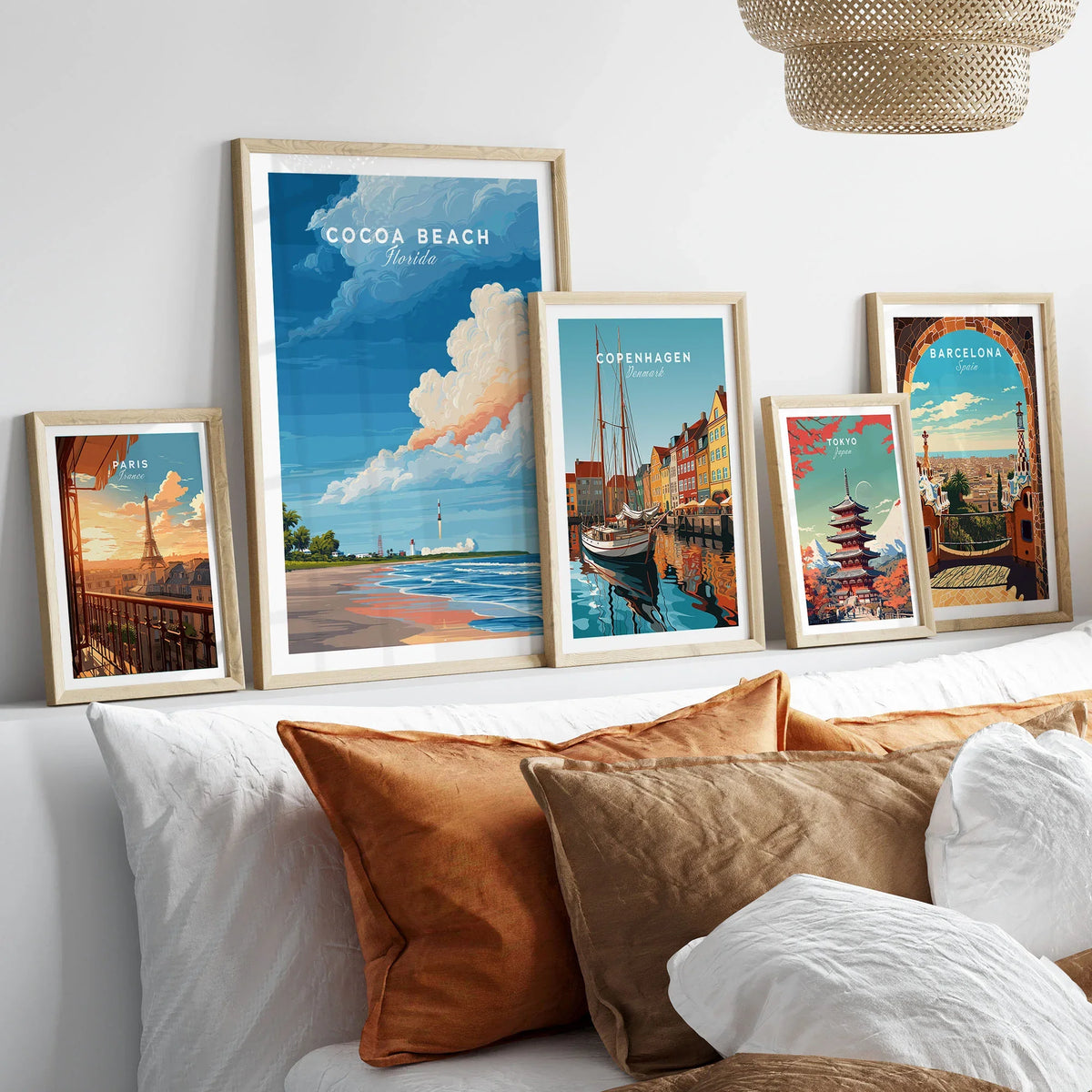 Cocoa Beach Florida Rocket Launch Print - Space Coast Wall Art in a gallery wall set of five framed travel prints in natural wood frames above a bed