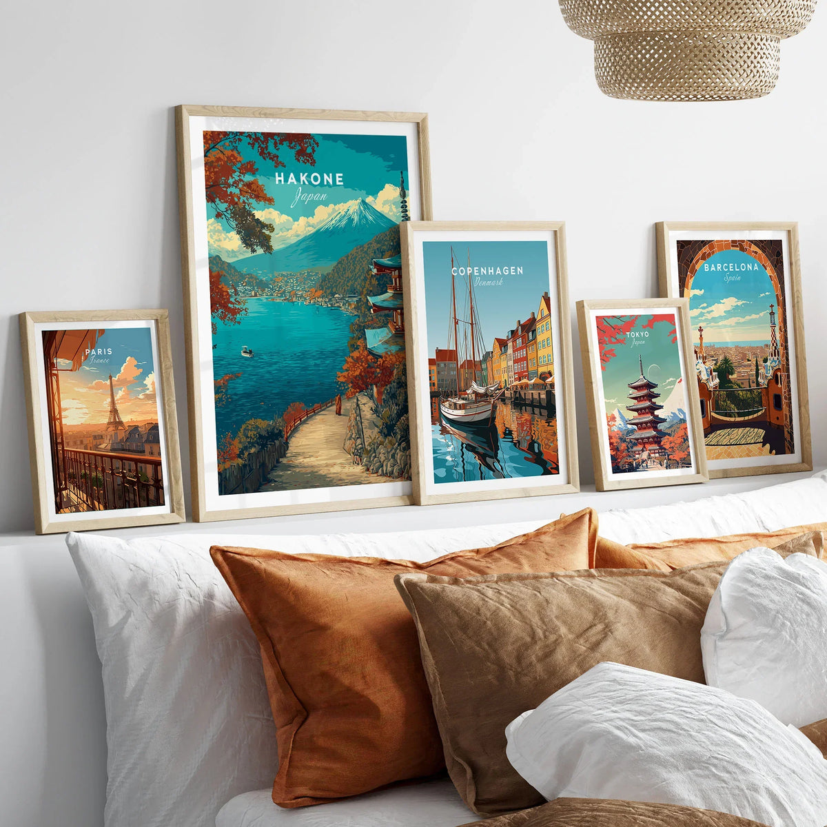 Hakone Print Japan Lake View Pagoda - Mount Fuji Scenic Poster in a gallery wall set of five framed travel prints in natural wood frames above a bed