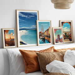 Isle of Harris Scotland Luskentyre Beach Print - White Sand Coastal Wall Art in a gallery wall set of five framed travel prints in natural wood frames above a bed