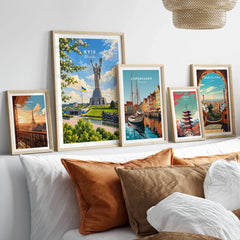 Kyiv Ukraine Motherland Monument Travel Poster — the Motherland Monument under spring blossom with the Ukrainian flag flying, shown as set five framed artprints above bed natural wood frames