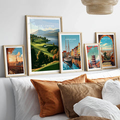 Loch Lomond Scotland Autumn Lochside Travel Poster — autumn slopes rolling down to Loch Lomond with Highland hills beyond, shown as set five framed artprints above bed natural wood frames