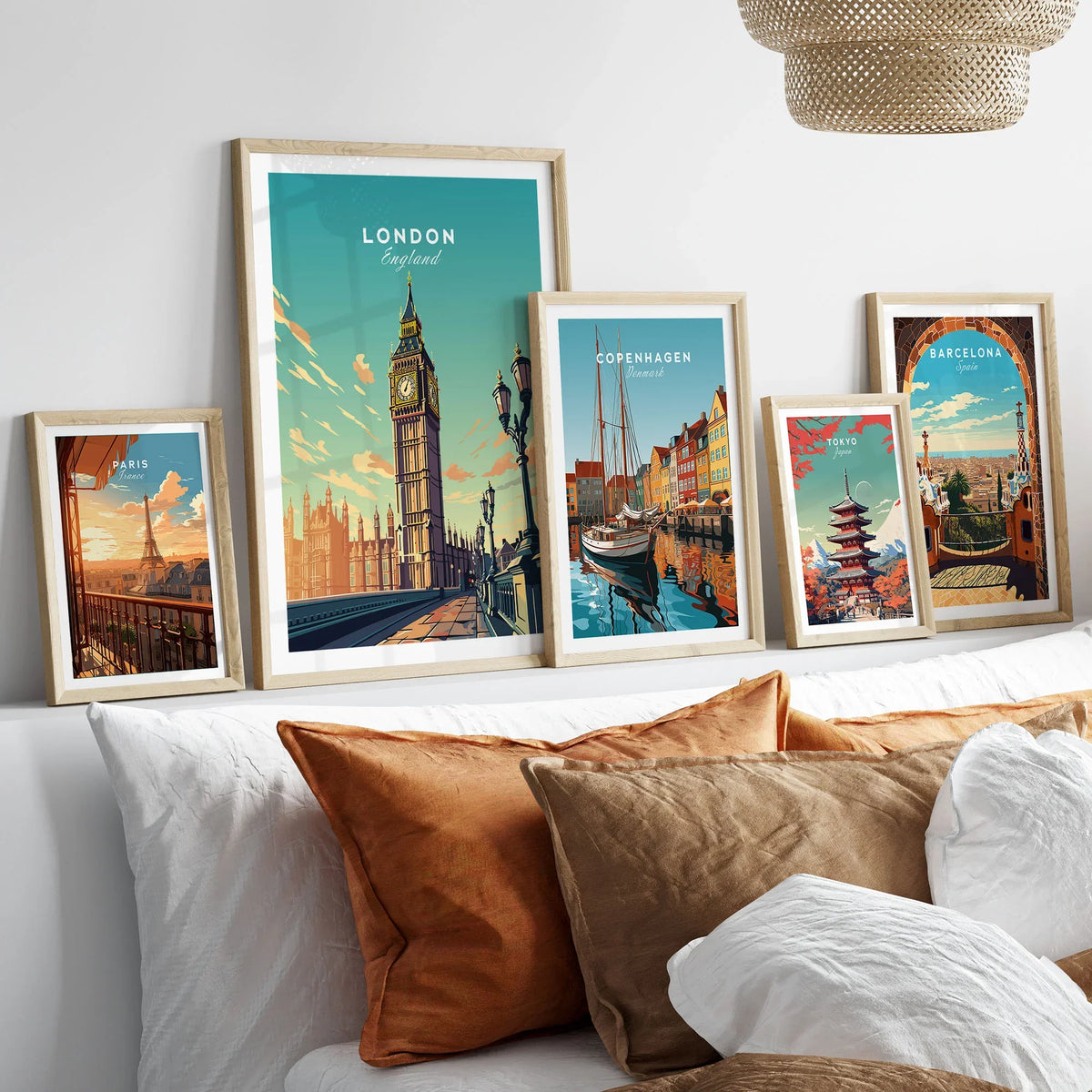 London Poster Big Ben in a gallery wall set of five framed travel prints in natural wood frames above a bed