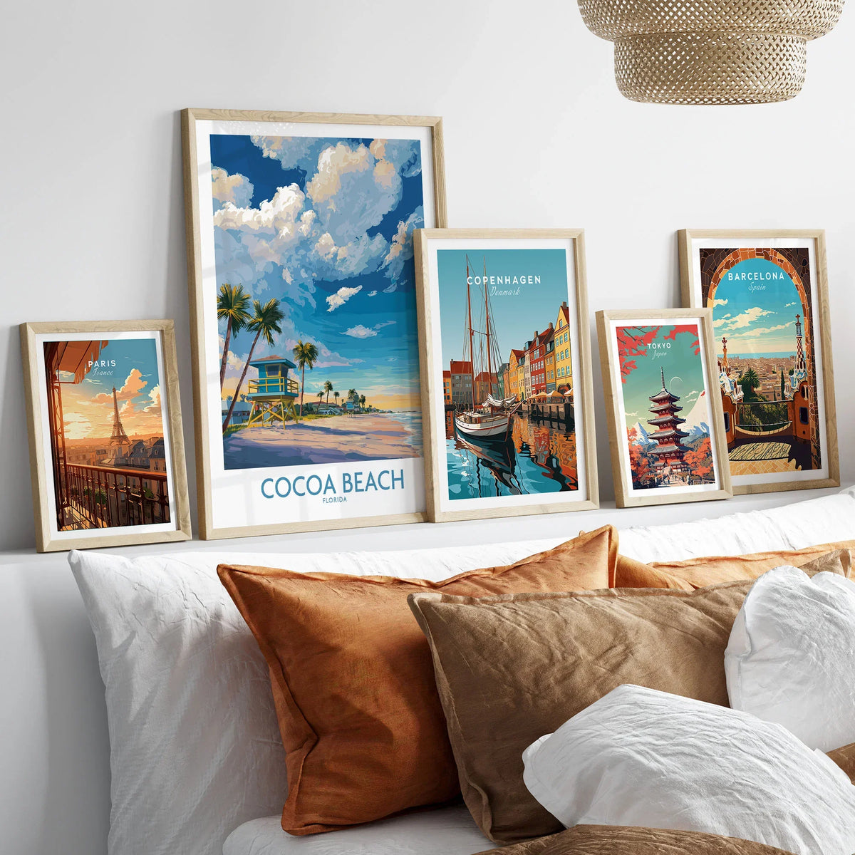 Cocoa Beach Florida Oceanfront Landscape Print - Florida Coast Decor in a gallery wall set of five framed travel prints in natural wood frames above a bed
