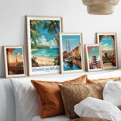 Dominican Republic Poster in a gallery wall set of five framed travel prints in natural wood frames above a bed