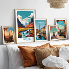 Glencoe Poster Print Modern in a gallery wall set of five framed travel prints in natural wood frames above a bed