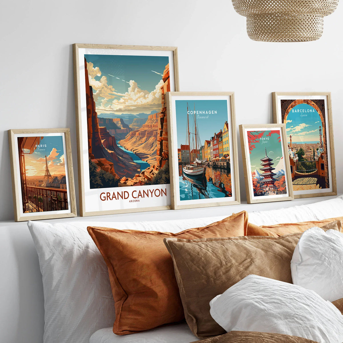 Grand Canyon Wall Art | Modern Style in a gallery wall set of five framed travel prints in natural wood frames above a bed