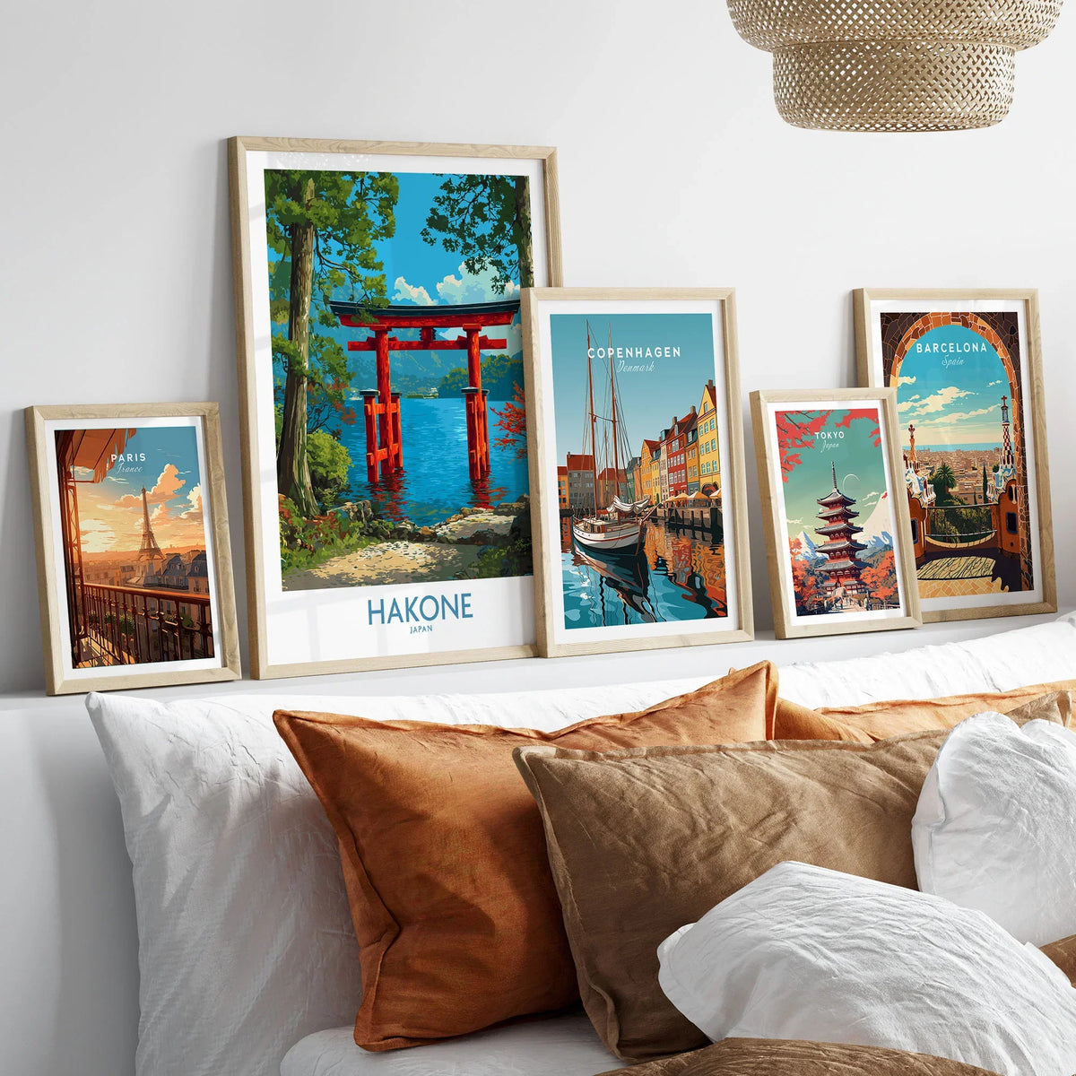 Hakone Japan Iconic Torii Print - Japanese Scenic Landscape Decor in a gallery wall set of five framed travel prints in natural wood frames above a bed