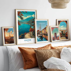 Hakone Japan Lakeside Temple Wall Art - Japanese Nature Travel Decor in a gallery wall set of five framed travel prints in natural wood frames above a bed