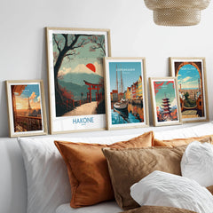 Hakone Japan Peace Gate Shrine Wall Art - Autumn Cherry Blossom Decor in a gallery wall set of five framed travel prints in natural wood frames above a bed