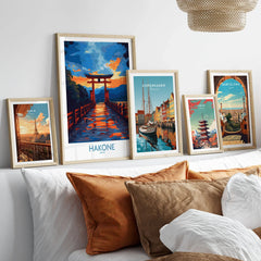 Hakone Wall Art - Japan Travel Poster in a gallery wall set of five framed travel prints in natural wood frames above a bed