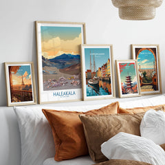Haleakalā National Park Print, Hawaiian Volcano Poster, Sunset Wall Decor in a gallery wall set of five framed travel prints in natural wood frames above a bed