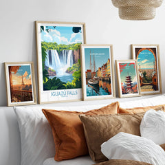 Iguazu Falls Travel Poster in a gallery wall set of five framed travel prints in natural wood frames above a bed