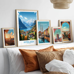 Interlaken Print in a gallery wall set of five framed travel prints in natural wood frames above a bed