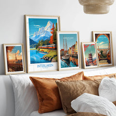Interlaken Poster Switzerland in a gallery wall set of five framed travel prints in natural wood frames above a bed