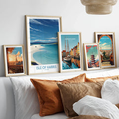 Isle of Harris Poster Scotland - Outer Hebrides Travel Print in a gallery wall set of five framed travel prints in natural wood frames above a bed
