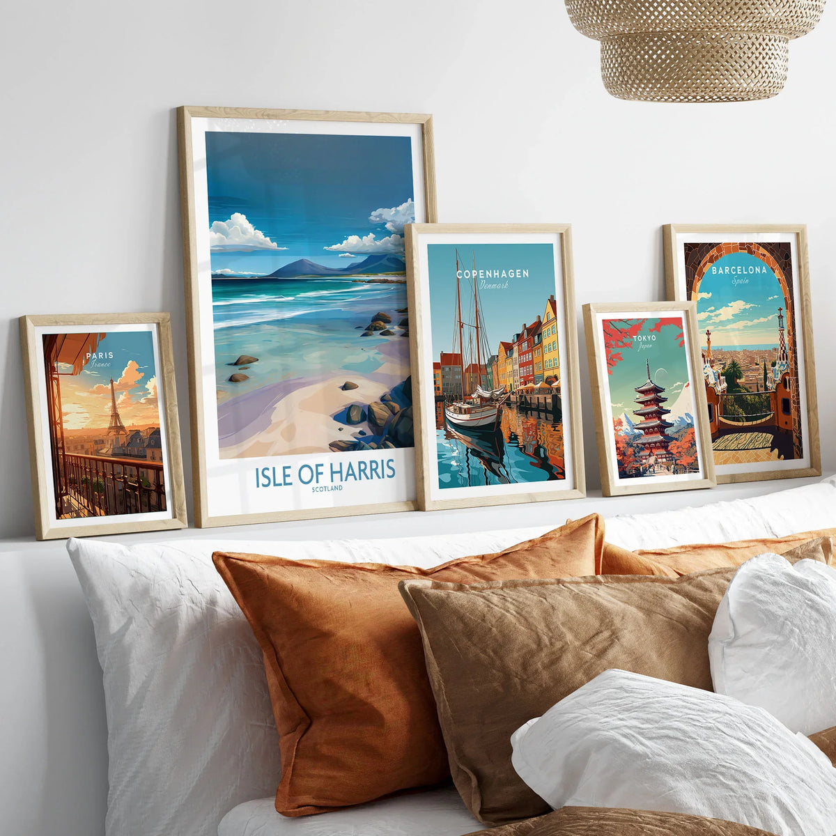 Isle of Harris Poster Scotland Clear Waters - Hebridean Seascape Decor in a gallery wall set of five framed travel prints in natural wood frames above a bed
