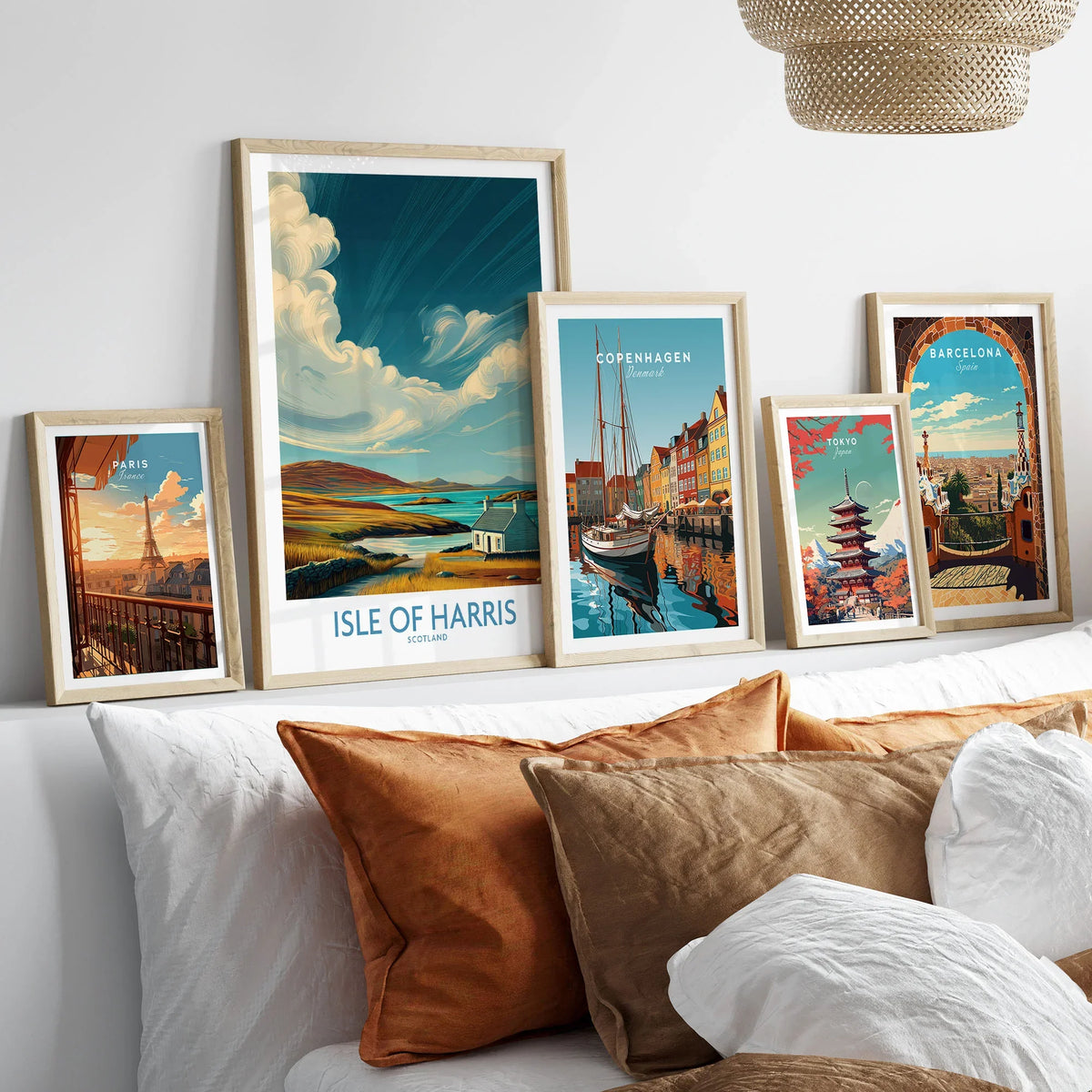 Isle of Harris Poster Scotland Dramatic Sky Seascape - Scottish Island Travel Decor in a gallery wall set of five framed travel prints in natural wood frames above a bed
