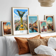 Kyiv Ukraine Maidan Square Wall Art — the Independence Monument rising above Maidan Nezalezhnosti and the Kyiv skyline, shown as set five framed artprints above bed natural wood frames