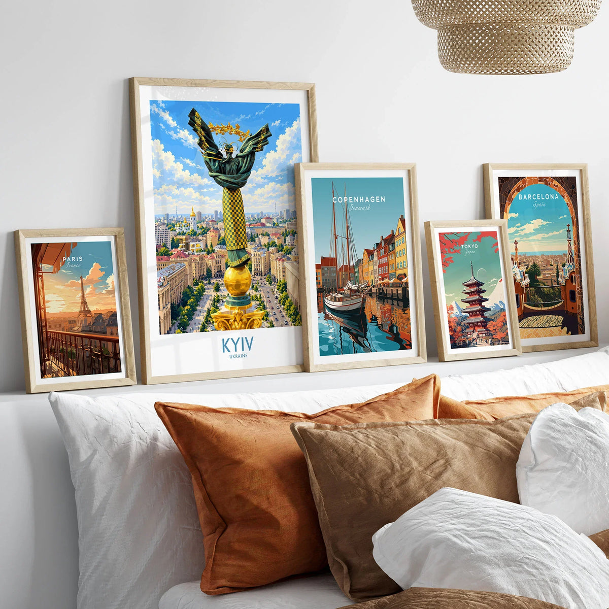 Kyiv Ukraine Maidan Square Wall Art — the Independence Monument rising above Maidan Nezalezhnosti and the Kyiv skyline, shown as set five framed artprints above bed natural wood frames