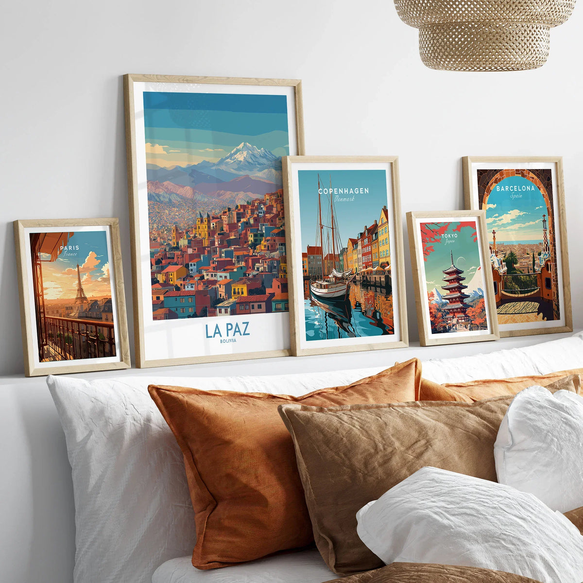 La Paz Bolivia Urban Landscape Wall Art - South American City Print in a gallery wall set of five framed travel prints in natural wood frames above a bed
