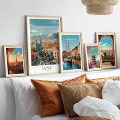 La Paz Bolivia Wall Art Poster - Bolivian Capital Travel Decor in a gallery wall set of five framed travel prints in natural wood frames above a bed