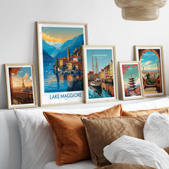 Lake Maggiore Italy Poster in a gallery wall set of five framed travel prints in natural wood frames above a bed