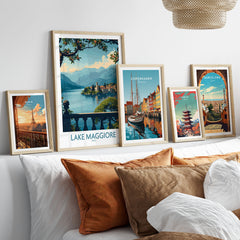 Lake Maggiore Poster Italy in a gallery wall set of five framed travel prints in natural wood frames above a bed