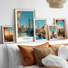 London Big Ben Wall Art | Modern Style in a gallery wall set of five framed travel prints in natural wood frames above a bed