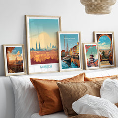 Munich Print Germany in a gallery wall set of five framed travel prints in natural wood frames above a bed