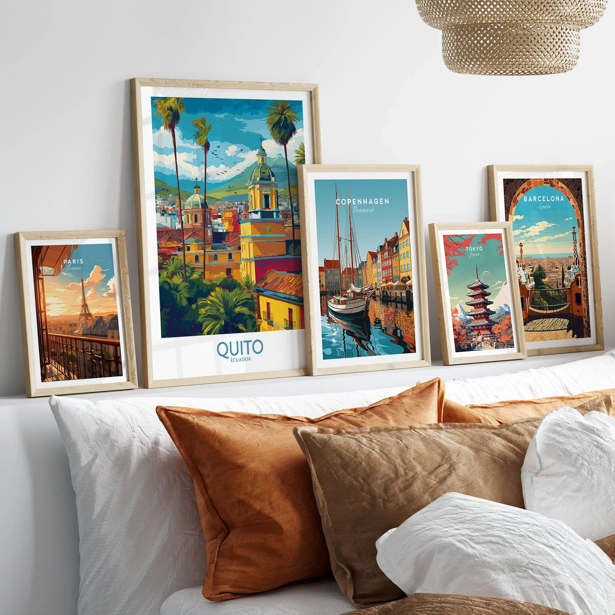 Ecuador Quito Cityscape Travel Print Poster Colonial Churches Andes Mountain Wall Art in a gallery wall set of five framed travel prints in natural wood frames above a bed