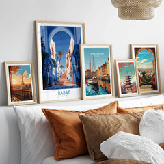 Rabat Morocco Blue Alleyway Wall Art — a blue-washed medina lane and stone steps seen through a horseshoe arch, shown as set five framed artprints above bed natural wood frames