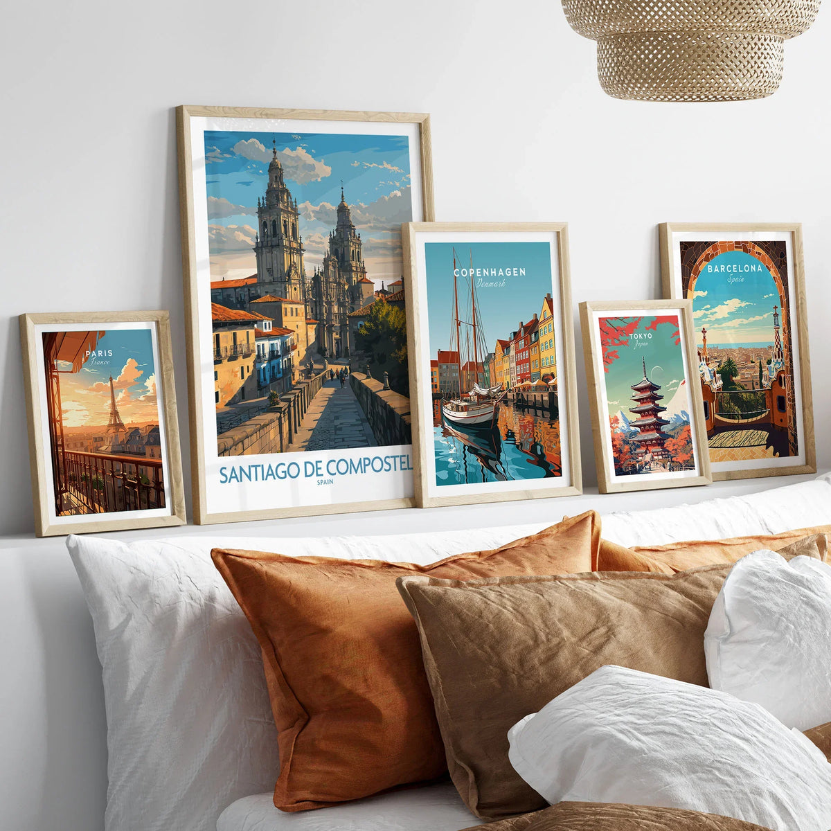 Santiago de Compostela Pilgrimage End Art Print | Cathedral Facade Poster in a gallery wall set of five framed travel prints in natural wood frames above a bed