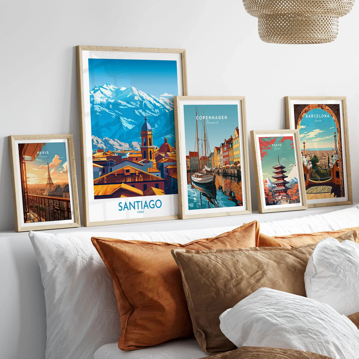 Santiago Wall Art Poster - Chile in a gallery wall set of five framed travel prints in natural wood frames above a bed