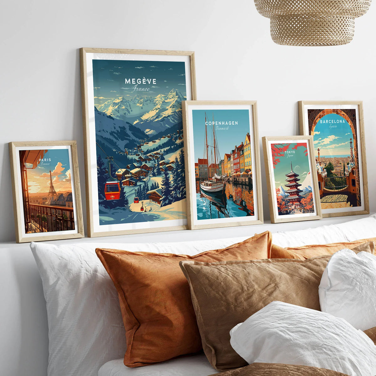 Megève Print France Ski Poster in a gallery wall set of five framed travel prints in natural wood frames above a bed