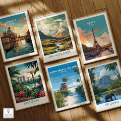 Set of six framed travel art prints featuring Venice, Paris, Scotland, Singapore, Sri Lanka, and Florida on a wooden floor.