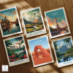 Six framed travel art prints on wooden floor featuring Venice, Paris, Highlands, Singapore, Arches National Park, and Sri Lanka.