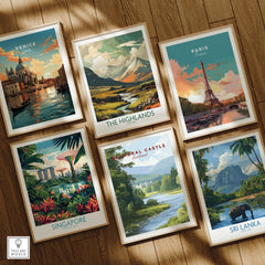 Set of six framed travel posters on wooden floor featuring Venice, Paris, Highlands, Singapore, Balmoral Castle, and Sri Lanka wall art.