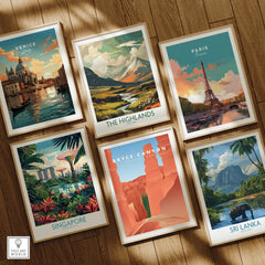 Set of six framed travel posters featuring Venice, Highlands, Paris, Singapore, Bryce Canyon, and Sri Lanka on a wooden floor.