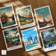 Set of six framed travel posters featuring Venice, Paris, The Highlands, Singapore, Busan, Sri Lanka on wooden floor