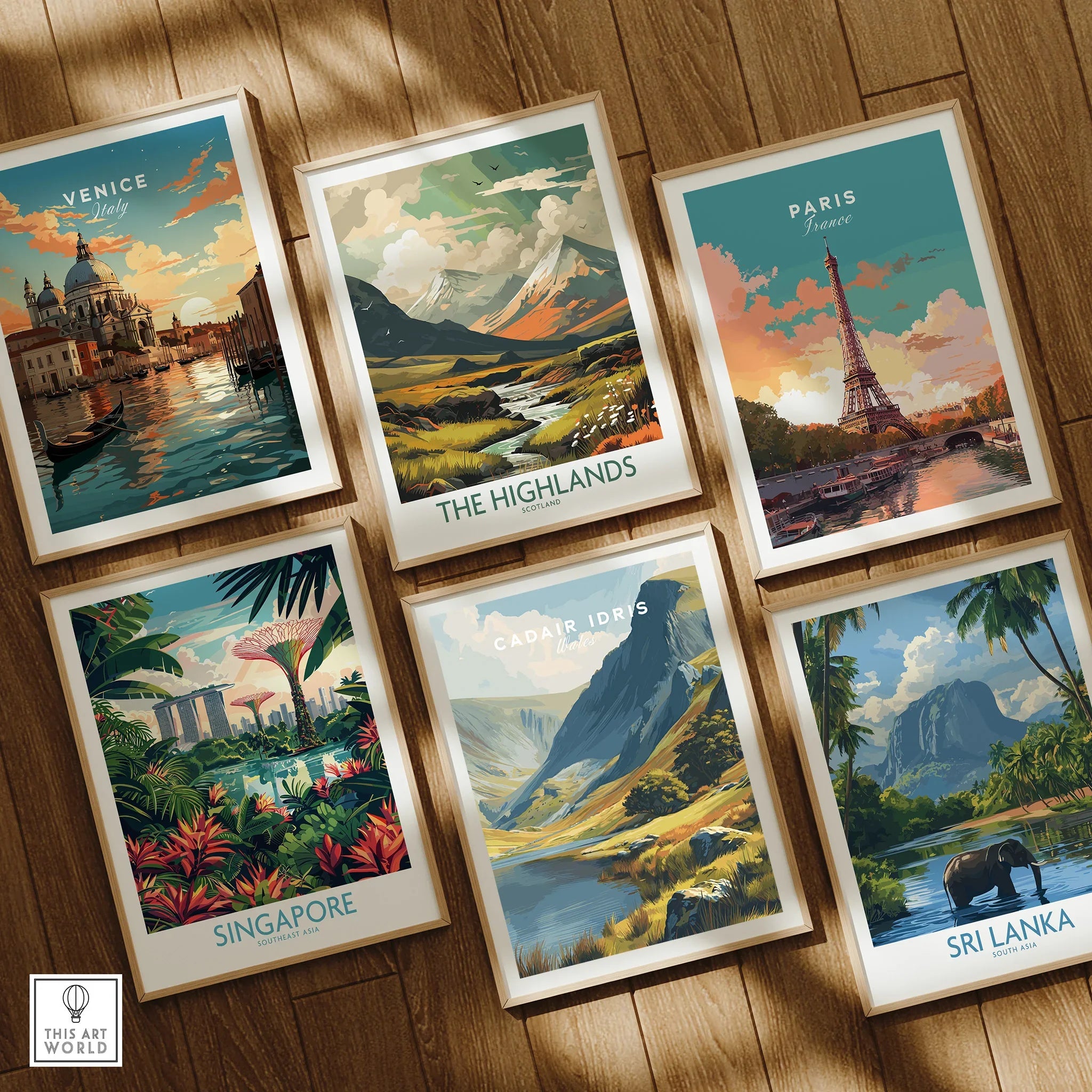 Set of six framed travel posters featuring landmarks and landscapes on wooden floor
