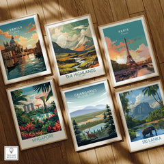 Six framed travel art prints on wooden floor showing Venice, Paris, Singapore, Highlands, Cairngorms, and Sri Lanka.