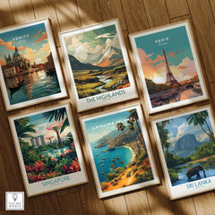 Set of six framed travel art prints featuring Venice, Paris, The Highlands, Singapore, Catalina Island, and Sri Lanka on a wooden floor.