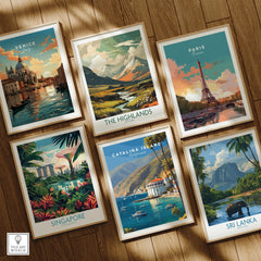 Set of six framed travel posters featuring Venice, Paris, Highlands, Singapore, Catalina Island, and Sri Lanka on a wooden floor.