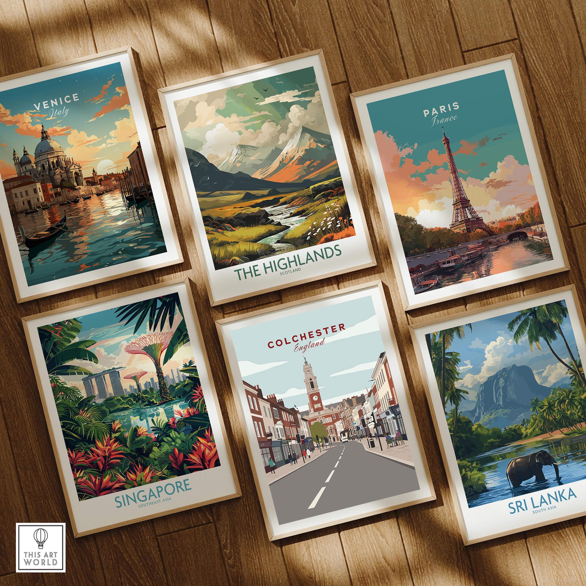 Set of six framed travel art prints featuring Venice, Paris, Highlands, Singapore, Colchester, and Sri Lanka on a wooden floor