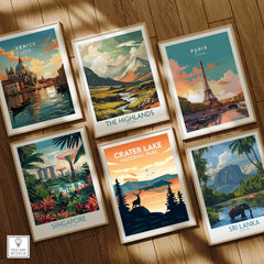 Set of six framed travel art prints on wooden floor, featuring Venice, Paris, Crater Lake, Singapore, Sri Lanka, and Scottish Highlands.