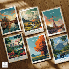 Set of six framed travel art prints on wooden floor, featuring Venice, Paris, Highlands, Greenwich, Singapore, and Sri Lanka.