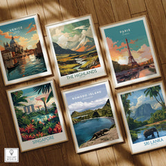 Set of six framed travel posters featuring Venice, Highlands, Paris, Singapore, Komodo Island, and Sri Lanka wall art on wooden floor.