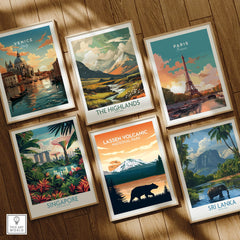 Set of six framed travel posters featuring Venice, Paris, Singapore, Highlands, Lassen Volcanic National Park, and Sri Lanka on a wooden floor.