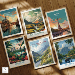 Set of six framed travel prints featuring Venice, Paris, Highlands, Singapore, Sri Lanka, Llanberis Pass, on wooden floor